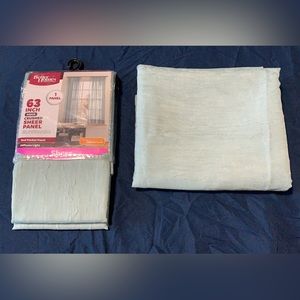 Two 63” Curtain Panels. Sheer light teal